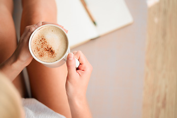 Image showing Above, stress relief and a woman with coffee and a notebook for writing in morning. Calm, hands and a girl with a drink and book for reflection, journaling or relaxing in a house on the weekend