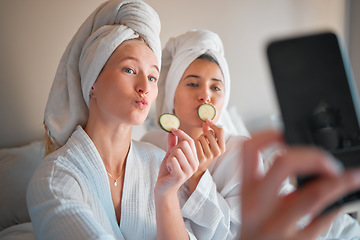 Image showing Woman, friends and selfie in beauty spa for social media, vlog or profile picture with cucumber in skincare treatment at resort. Happy women posing for photo in natural zen or body care at salon