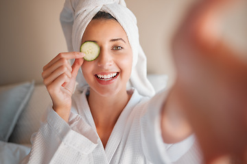 Image showing Woman, spa and selfie with cucumber on eye in comic portrait for wellness, self care and relax. Girl, fruit and face for skincare, health and smile for cosmetics, beauty and natural glow in morning