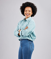 Image showing Crossed arms, happy and portrait of black woman in studio with pride, confidence and excited smile. Fashion, happiness mockup and girl with positive mindset, cosmetics and beauty on white background