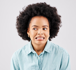 Image showing Black woman, afro and oops face in studio with comic expression for fail by white background. Girl, model and african student with mistake, accident or thinking of bad decision in memory by backdrop