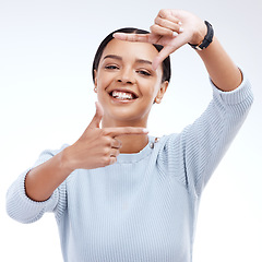 Image showing Frame, hands and portrait of woman on a white background for beauty, cosmetics and natural makeup. Fashion, focus mockup and face of girl isolated with happiness, smile or photography emoji in studio