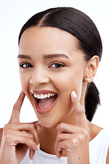 Image showing Happy, gesture and portrait of a woman for beauty isolated on a white background in a studio. Smile, skincare and face of a young model looking confident about clear complexion and smooth skin