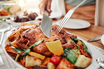 Image showing Food, cutting roast chicken on tablet and dinner, party or celebration with Christmas or thanksgiving holiday. Social event, closeup and carve protein with knife, gourmet meal and festive feast