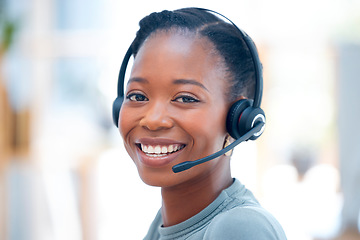 Image showing Happy, portrait and a black woman in call center with a smile for consulting and telemarketing. Contact us, happiness and the face of an African customer service agent working in online support