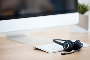 Image showing Call center help desk, computer or headset for communication for telecom customer services. Keyboard, background or crm office workplace for technical support, telemarketing sales or consulting job