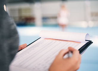 Image showing Hand, documents and assessment in a gym with a coach watching a performance in preparation of competition. Paper, checklist and personal trainer in a sports center for fitness, planning or review