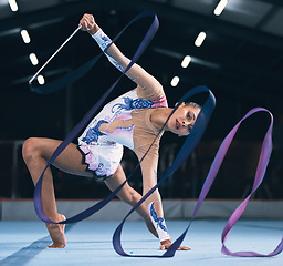 Image showing Portrait of flexible woman, ribbon gymnastics and dance for performance, sports competition and action show. Female, rhythmic movement and dancing athlete with creative talent, balance and agility