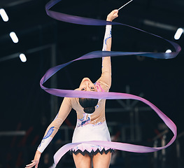 Image showing Ribbon gymnastics, flexible woman and dancing in performance, training and competition from the back. Female dancer, rhythmic movement and elegant action of creative talent, sports and concert event