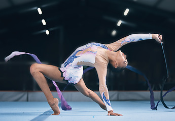 Image showing Ribbon, gymnastics and flexible woman stretching in performance, dance training and sports competition. Female, rhythmic movement and dancing athlete, creative skill and talent for concert in arena