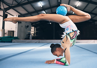 Image showing Woman, gymnastics and ball for flexible performance, body balance and dancer in sports arena. Female, rhythmic movement and dancing upside down for creative talent, solo concert and agility challenge