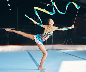 Image showing Ribbon, gymnastics and flexible woman stretching in performance, dancer training and sports competition. Female athlete, rhythmic movement and balance for creative skill, talent and concert in arena