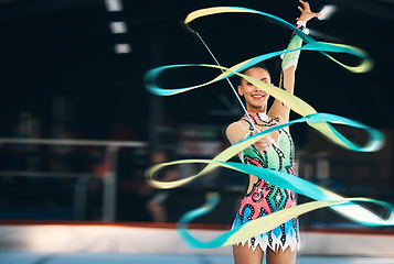 Image showing Ribbon dancing, portrait and happy woman in gymnastics competition, talent show and dark mockup arena. Female dancer, rhythmic movement and smile for action, creative performance and sports concert