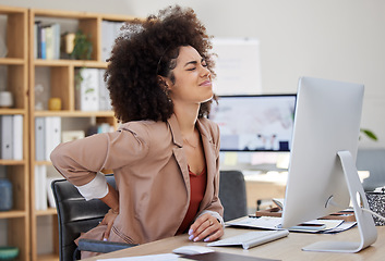 Image showing Back pain, stress and woman working on computer with medical, healthcare and muscle problem for office burnout. Fatigue, frustrated and biracial person or business employee with spine risk in chair