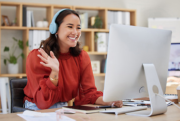 Image showing Headphones, computer and woman video call, webinar or virtual meeting, talking and online networking in business office. Happy Asian person wave hello on her desktop pc in client chat at tech company