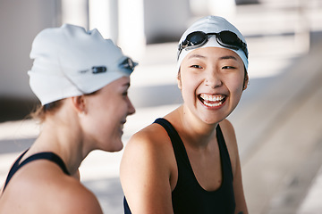 Image showing Swimming team, women and happy with sports and fitness, athlete at pool with laughter and fun during training. Female swimmer, friends and trust with happiness, exercise with water sport and workout