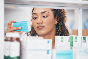 Image showing Medicine, search and shelf with woman in pharmacy for medical, inventory and product stock. Healthcare, retail and drugstore with female and check for information, pills and expert with box