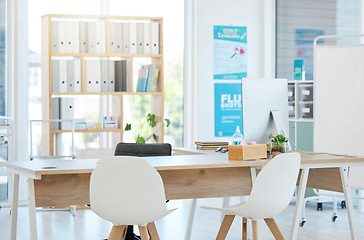 Image showing Medical, consulting and hospital with desk in empty room for healthcare, wellness or interior design. Medicine, space and insurance with nobody and furniture in clinic for diagnosis, surgery or virus