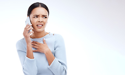 Image showing Confused, phone call and shocked woman with mobile glitch or internet problem online isolated in a studio white background. Angry, annoyed and female with error on a cellphone conversation