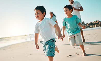 Image showing Happy, family and boys on a beach, running and summer vacation for bonding, loving and quality time. Run, mother and father with male children, kids and fitness on seaside holiday, happiness and joy