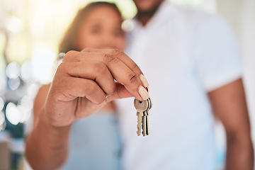 Image showing Keys, home and hands of couple in apartment excited for moving into new house, property and real estate. Homeowners, relationship and happy man and woman with key for mortgage, investment and rent