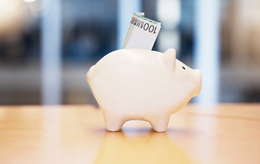 Image showing Saving, money and piggybank on a table for finance, budget and investment. Security, dollar and a tool for savings, cash safety and financial growth at a company for banking and pension wealth