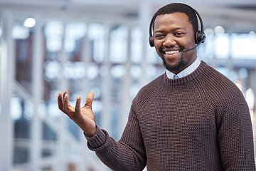 Image showing Call Center or black man consultant with empty hand marketing a product, brand and advertising in an office. Portrait, customer service and employee in mockup space for branding a logo in his palm