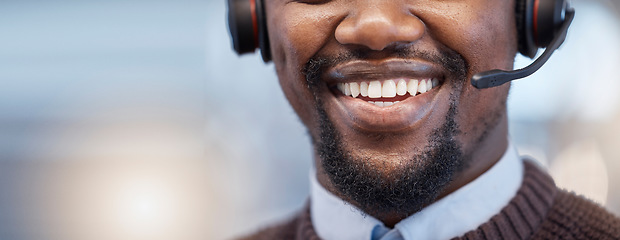 Image showing Happy, mouth and closeup of a call center agent with a smile while doing an online consultation. Contact us, mockup and face of an African male customer service representative with headset in office.