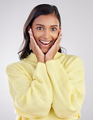 Image showing Portrait, wow and woman excited, surprise and happiness isolated on a white studio background. Face, female model or person with joy, smile or winner with positive news, facial expression or cheerful