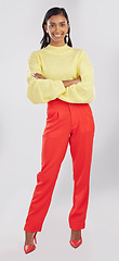 Image showing Fashion, happy and portrait of a woman in a studio with a stylish, trendy and casual outfit. Smile, style and full body of an Indian female model with crossed arms for confidence by a gray background