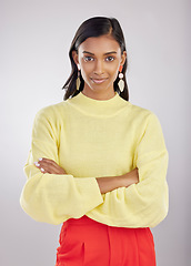 Image showing Confident, corporate and portrait of woman arms crossed feeling proud isolated in a studio white background. Confidence, assertive and young Indian female worker, leader or employee with calm mindset
