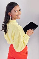 Image showing Happy, portrait and a woman with a tablet for an email, communication and the internet. White background, isolated and an Indian girl with technology for social media, business app and the web