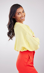 Image showing Happy, pride and the portrait of a woman with arms crossed isolated on a white background. Smile, happiness and a girl standing with empowerment, positivity and confidence on a studio backdrop