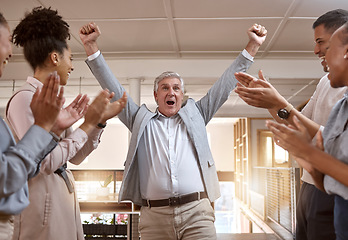 Image showing Business people, celebration and winning with applause for promotion, success or teamwork at office. Happy senior businessman in joy for win, victory or achievement with team clapping at workplace