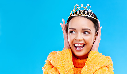 Image showing Mockup, crown or happy with woman in studio for celebration, princess and party. Smile, beauty and fashion with female tiara on blue background and excited for achievement, winner and wow prom event
