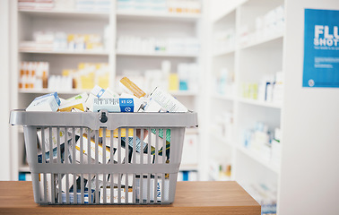 Image showing Healthcare background, pharmacy and basket of medicine for shopping, drugstore service and consumer market. Retail dispensary, pharmaceuticals and cart of pills, supplement boxes and medical economy