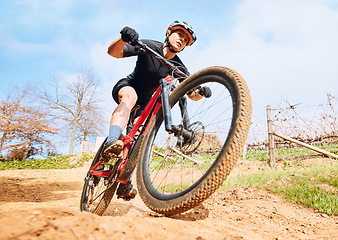 Image showing Race, nature and a man on a bike for cycling, fitness and training in the countryside. Exercise, adventure and a professional cyclist riding a bicycle for a workout, cardio or sports practice