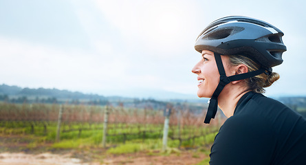 Image showing Happy, fitness and woman relax while cycling in the countryside, smile and resting in nature. Cheerful, sports and female cyclist on break in Mexico for travel, vacation or cardio, routine or workout