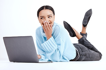 Image showing Studio, floor and woman with a laptop, smile and excited girl isolated on a white studio background. Female model, happy or person with device, connection or communication with joy, funny or cheerful