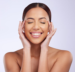 Image showing Woman, natural beauty and skincare in a studio with happiness and smile from dermatology. Skin glow, facial and cosmetics of a young female model feeling happy from self care and face wellness