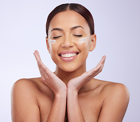 Image showing Face cream, beauty and woman in studio for skincare, treatment and dermatology on purple background. Facial, lotion and sunscreen for happy lady model relax with spf, moisturiser or skin routine