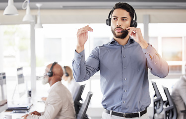 Image showing Businessman, call center or consulting headphones for customer service, telemarketing or support office. Man, consultant or headset talking for problem solving, help or team management in contact us