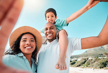 Image showing Happy family, smile and selfie at beach for summer with child, mother and father for fun. Man, woman and boy kid portrait for happiness and freedom on a holiday with love, care and support outdoor