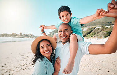 Image showing Family, happy and portrait at beach for summer with child, mother and father for fun. Man, woman and boy kid smile for happiness, play and freedom on a holiday with love, adventure and travel outdoor