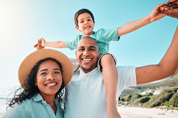 Image showing Happy family, smile and portrait at beach for summer with child, mother and father for fun. Man, woman and boy kid playing for happiness and freedom on a holiday with love, care and support outdoor