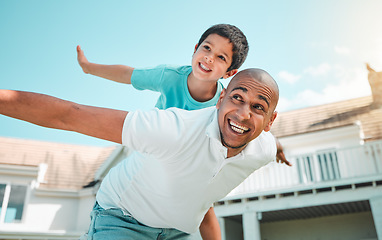 Image showing Father and child playing airplane outdoor as family in backyard of house with a smile, love and care. Man and boy kid for game, security and quality time with happiness and arms outstretched on sky