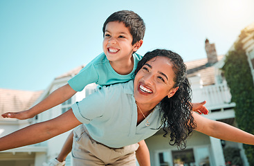 Image showing Mother, child or happy family outdoor playing airplane game for fun in backyard. Young woman and boy kid play for happiness, freedom and adventure on a travel holiday with love and a smile outdoor