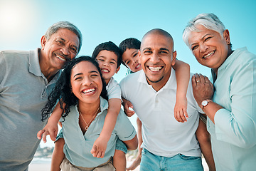 Image showing Family, happy and portrait at beach for summer with children, parents and grandparents for fun. Happy men, women and boy kids playing for happiness on a holiday with love, care and support outdoor