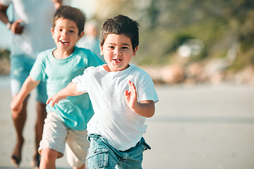 Image showing Running, playful and portrait of children at the beach for a holiday, weekend fun and bonding. Happy, freedom and boy kids at the sea in nature to run, play and be free with family on vacation