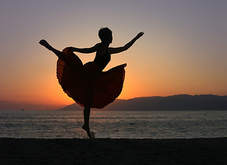 Image showing Dancing woman on the beach